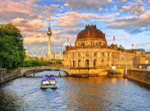 Bode museum on Spree river and Alexanderplatz TV tower in center of Berlin, Germany