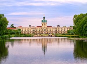 Charlottenburg royal palace in Berlin, Germany, view from lake to English garden