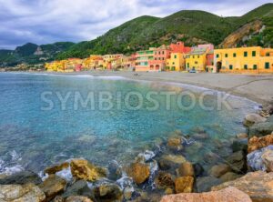 Colorful fisherman’s houses on the sand beach lagoon Varigotti, Liguria, Italy