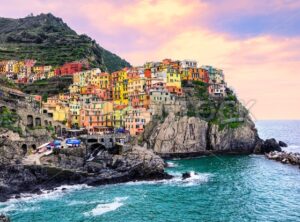 Colorful houses on a rock in Manarola, Cinque Terre, Italy