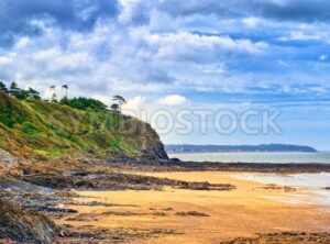 Desolated atlantic beach in Normandy by Granville, France