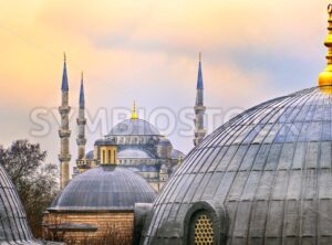 Domes of Blue Mosque in Istanbul on sunset