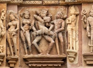 Erotic sculptures in hindu temple in Khajuraho, India