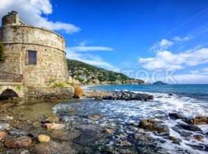 Historical Saracen tower in Alassio, resort town on Riviera, Italy