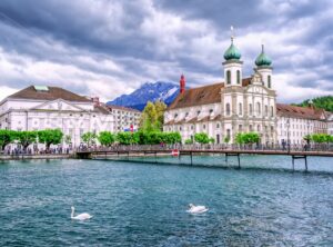 Lucerne, Switzerland, Jesuite churche, Reuss river and Mount Pilatus in background