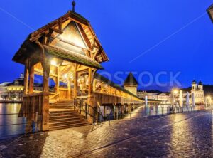 Lucerne, Switzerland, entrance to wooden Chapel Bridge at late evening