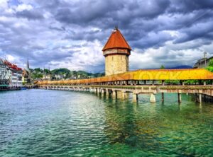 Lucerne, Switzerland, wooden Chapel bridge over Reuss river and Water tower