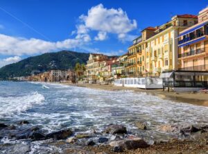 Mediterranean beach in touristic town Alassio on italian Riviera, Italy