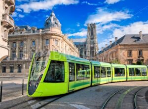Modern tram on the streets of the old town of Reims, France