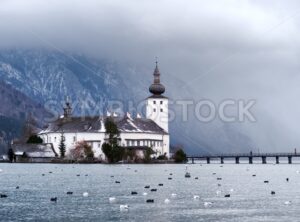 Monastery on the island of alpine lake in Gmunden by Salzburg, Austria