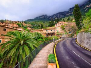 Mountain road winding through little spanish town, Spain