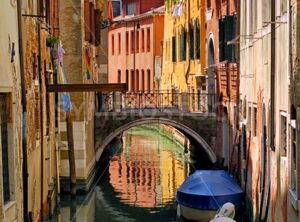 Narrow channel street in Venice, Italy