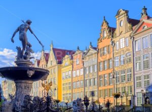 Neptune statue with colorful houses in background, Gdansk, Poland