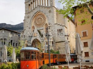Old tram in front of the Cathedral of Soller, Mallorca, Spain