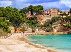 Seaside villas over the sand beach, Mallorca, Spain