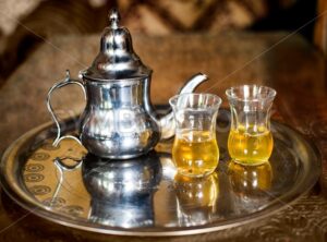 Set of arabic nana mint tea with metal tea pot and glasses