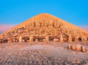 Statues on the summit of Mount Nemrut in Turkey on sunrise