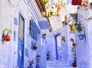 Street with stairs in medina of moroccan blue town Chaouen