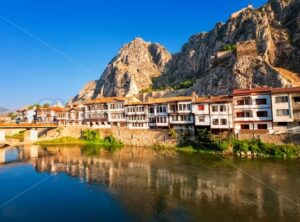 Traditional ottoman houses reflecting in the river, Amasya, Turkey