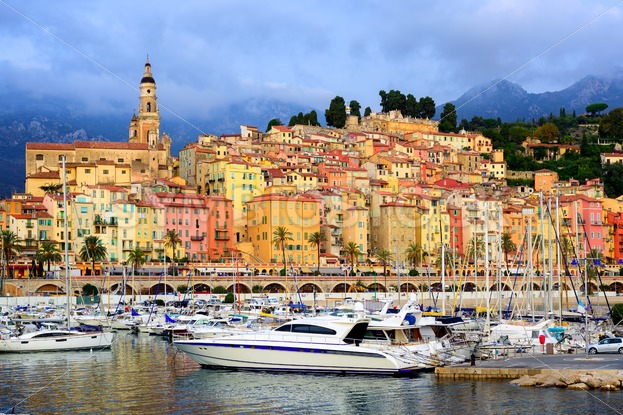 Yachts in the marina of colorful medieval town Menton on french Riviera ...