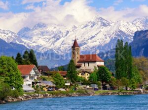 Brienz town near Interlaken and snow covered Alps mountains, Switzerland