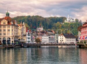 Old town of Lucerne reflecting in Reuss River, Switzerland