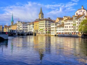 Old town of Zurich with Clock Tower, Switzerland - GlobePhotos - royalty free stock images