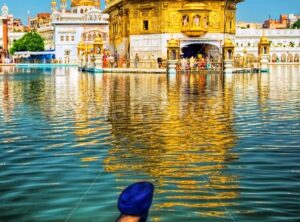 Sikh prayer in lake of Golden Temple, Amritsar, India - GlobePhotos - royalty free stock images
