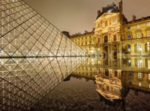 Louvre museum and glass Pyramid at night, Paris, France - GlobePhotos - royalty free stock images