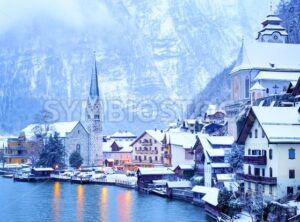 Hallstatt wooden village on lake in snow white, Austria - GlobePhotos - royalty free stock images