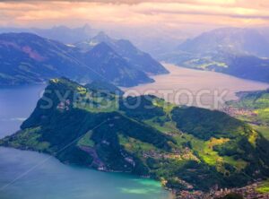 Swiss Alps mountains and Lake Lucerne on dramatic sunset - GlobePhotos - royalty free stock images