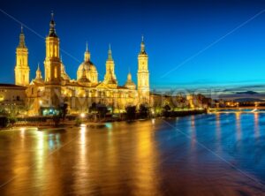 Zaragoza city, Spain, view over river to Cathedral at evening - GlobePhotos - royalty free stock images