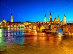 Zaragoza city, Spain, view over river to Cathedral at sunset - GlobePhotos - royalty free stock images