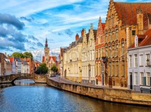 Bruges Old Town, canal and Poortersloge building, Belgium - GlobePhotos - royalty free stock images