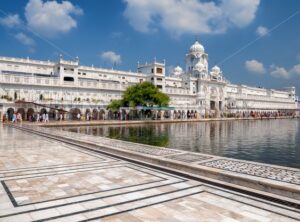 White palace of the Golden Temple in Amritsar, India - GlobePhotos - royalty free stock images