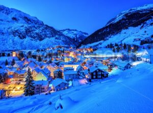 Andermatt village in Alps mountains in winter snow, Uri, Switzerland - GlobePhotos - royalty free stock images