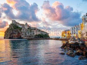 Aragonese Castle and Ischia town on sunrise, Italy