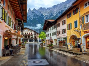 Colorful houses in Mittenwald Old town, Alps mountains, Germany