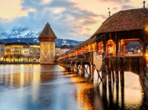 Lucerne city, historical Chapel bridge on sunset