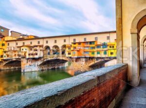 Ponte Vecchio bridge and riverside promenade in Florence, Italy