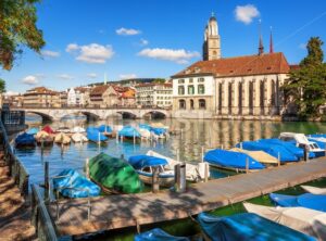 Boats on Limmat river in Zurich city center, Switzerland