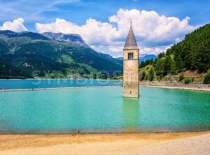 Church in the lake Reschensee bell tower, South Tyrol, Italy