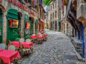 Cobbled street in the Old town of Dinan, Brittany, France