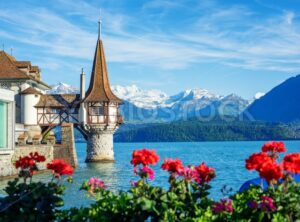 Oberhofen castle on Lake Thun, Switzerland, Alps mountains