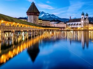 Chapel bridge and Mount Pilatus in Lucerne town, Switzerland