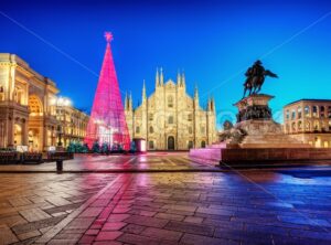 Milan Duomo cathedral square illuminated at Christmas time, Italy
