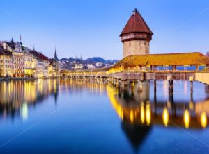 Chapel bridge in Lucerne city, Switzerland, on a blue evening