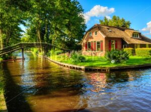 Water canal in Giethoorn village, Netherlands - GlobePhotos - royalty free stock images