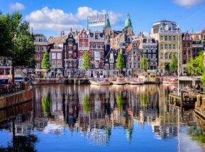 Amsterdam city, traditional houses on Amstel river, Netherlands