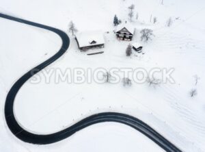 Road winding in the swiss Alps mountains in winter time